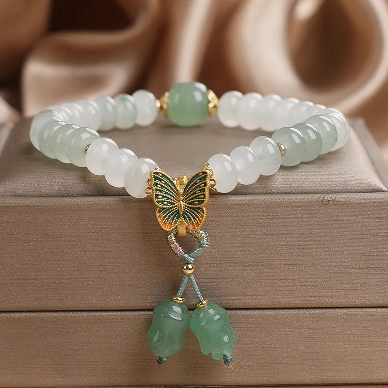 Green Tian Shan Cui abacus beads jade bracelet with retro butterfly and crystal tassel decoration