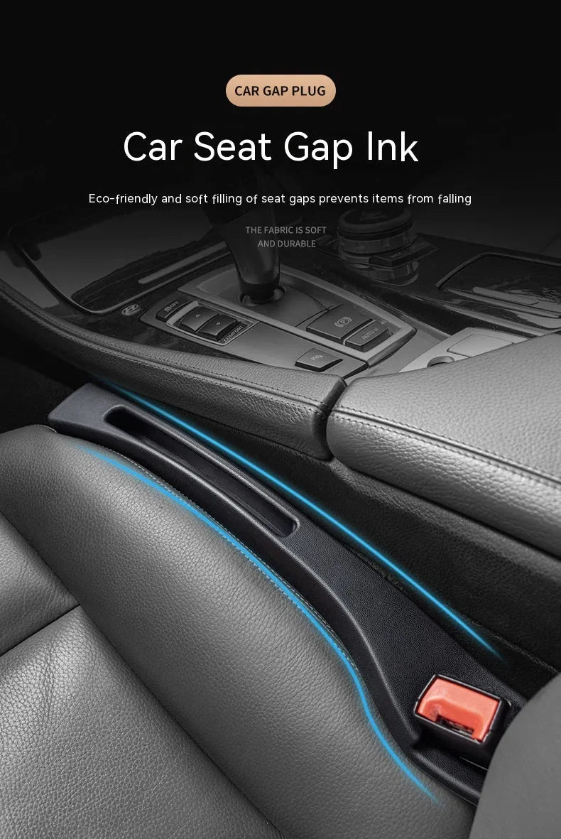Black plastic car seat gap storage box organising items between vehicle seats