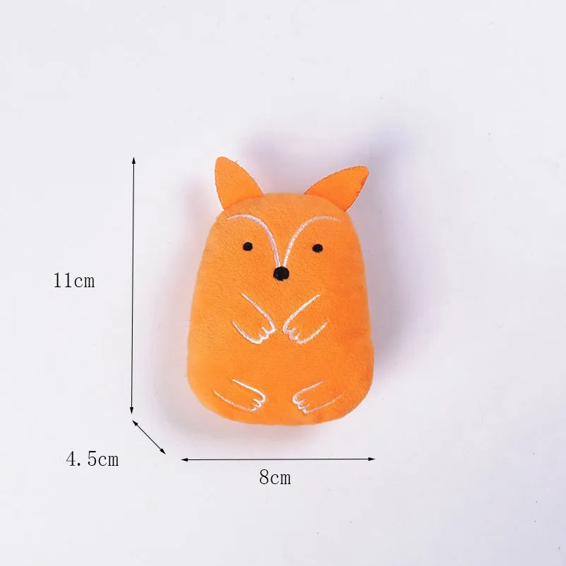 Set of four small coloured plush cat chew toys with catnip, shown next to a measuring tape indicating 11 cm length.