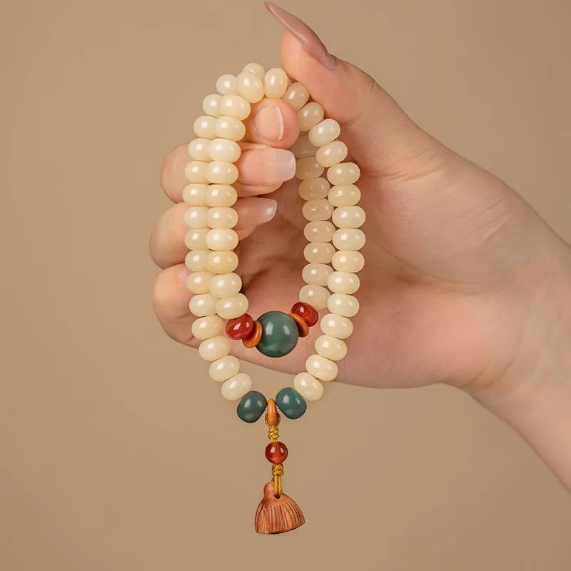Cream topaz wooden bodhi bracelet with 6 by 9mm flat round beads for women