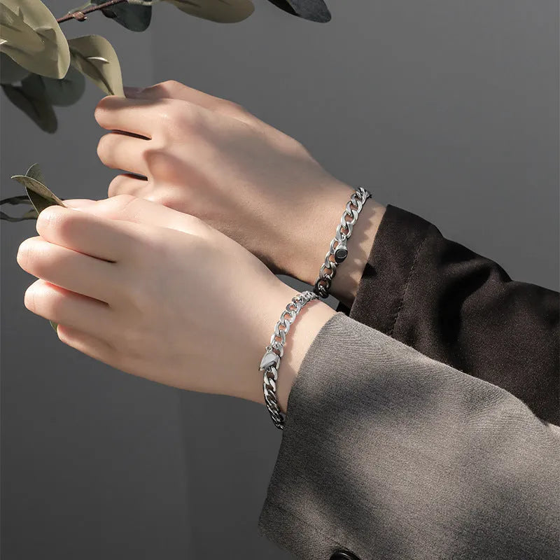 Magnetic couple bracelet set with silver heart charm on stainless steel chain