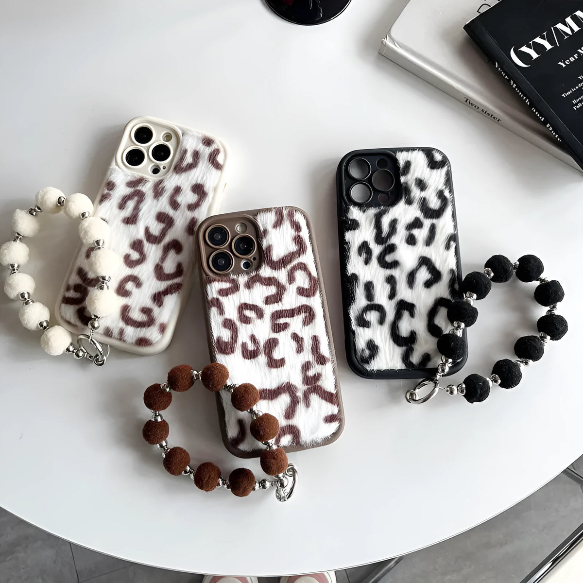 Leopard printed plush silicone iPhone case with chain and bracelet in brown, black or beige