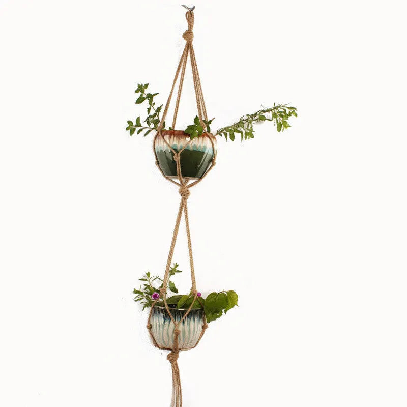 Woven cotton rope and wire basket planter in a rustic style for wall or desktop plant display.