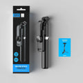 Portable retractable selfie stick tripod with Bluetooth remote and stainless steel shaft in black on a flat surface