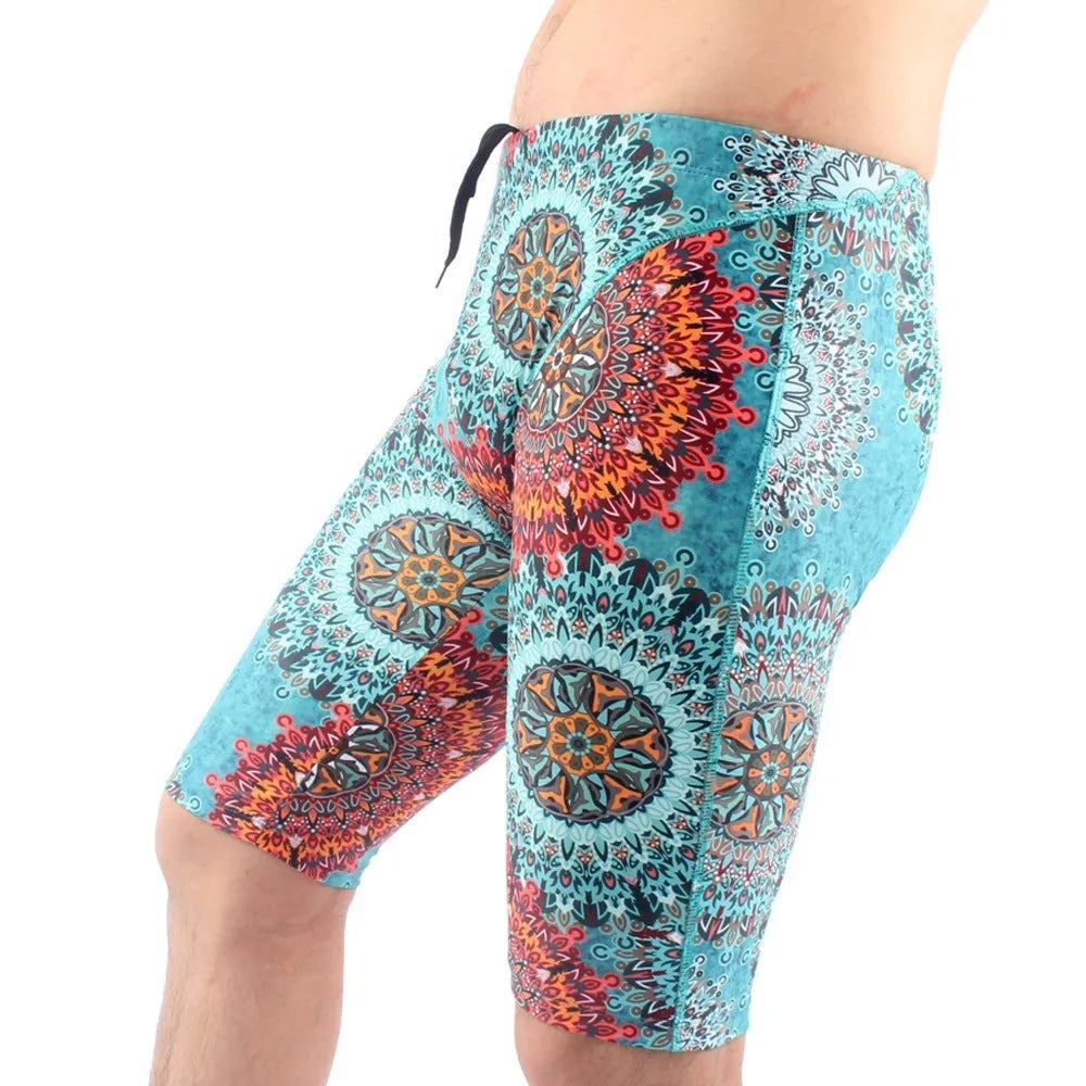 Men's green loose-fit five-point swimming trunks made from quick-drying nylon fabric.