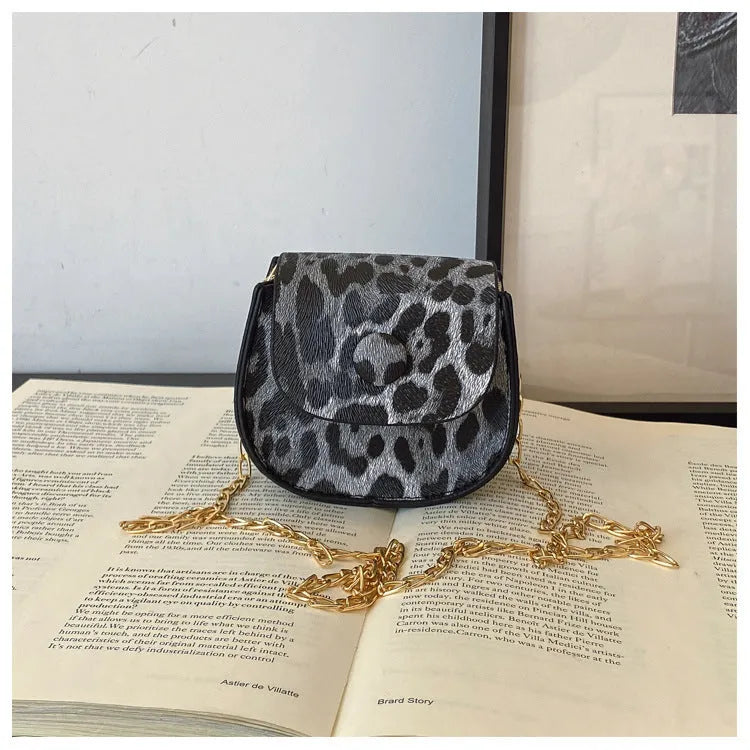 Mini leopard print PU saddle bag in horizontal square shape, with sandwich pocket, black or reddish brown