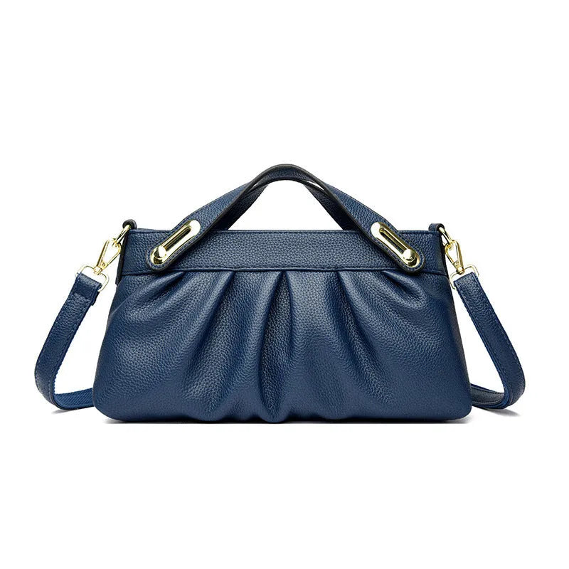 Genuine leather crossbody bag with pleated shoulder strap and wrinkled composite leather finish in horizontal square shape