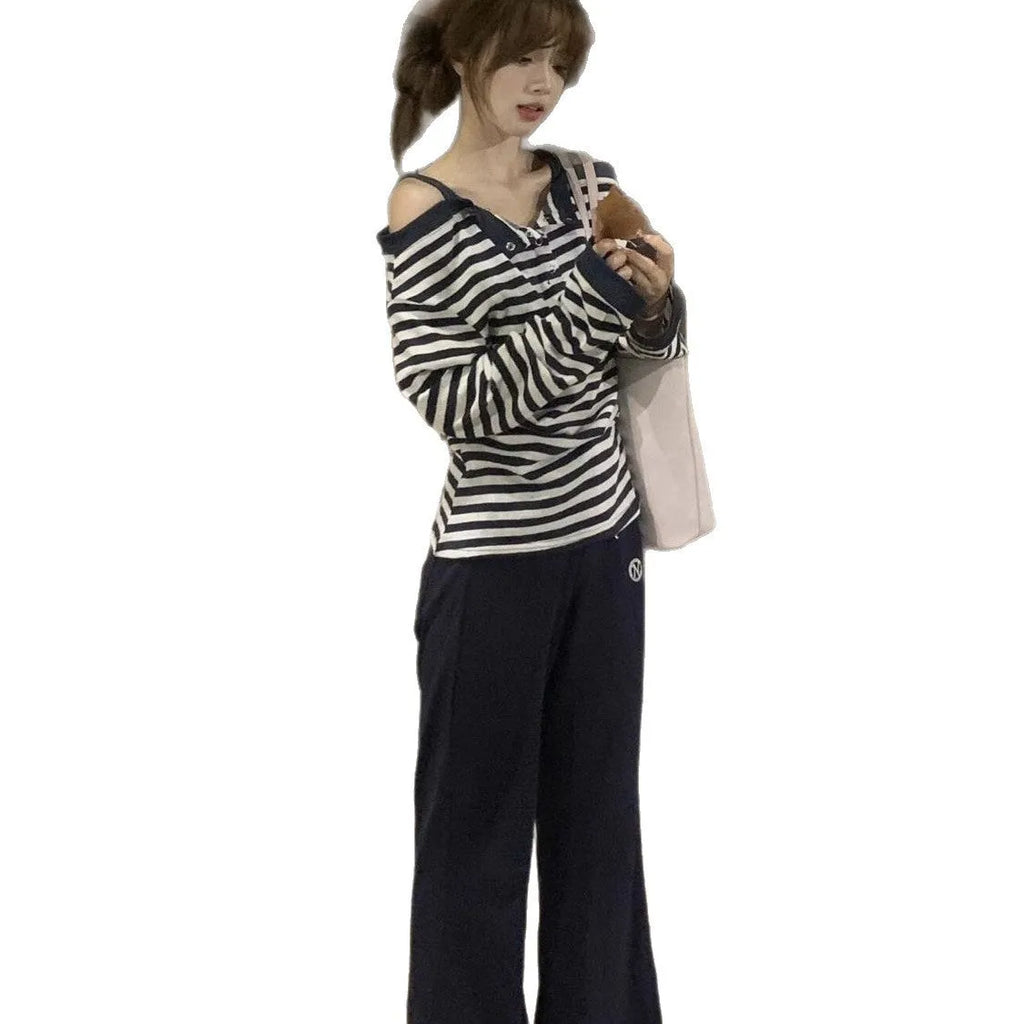 Dark blue oversized women's long-sleeved T-shirt with Korean-style embroidery and stripes.