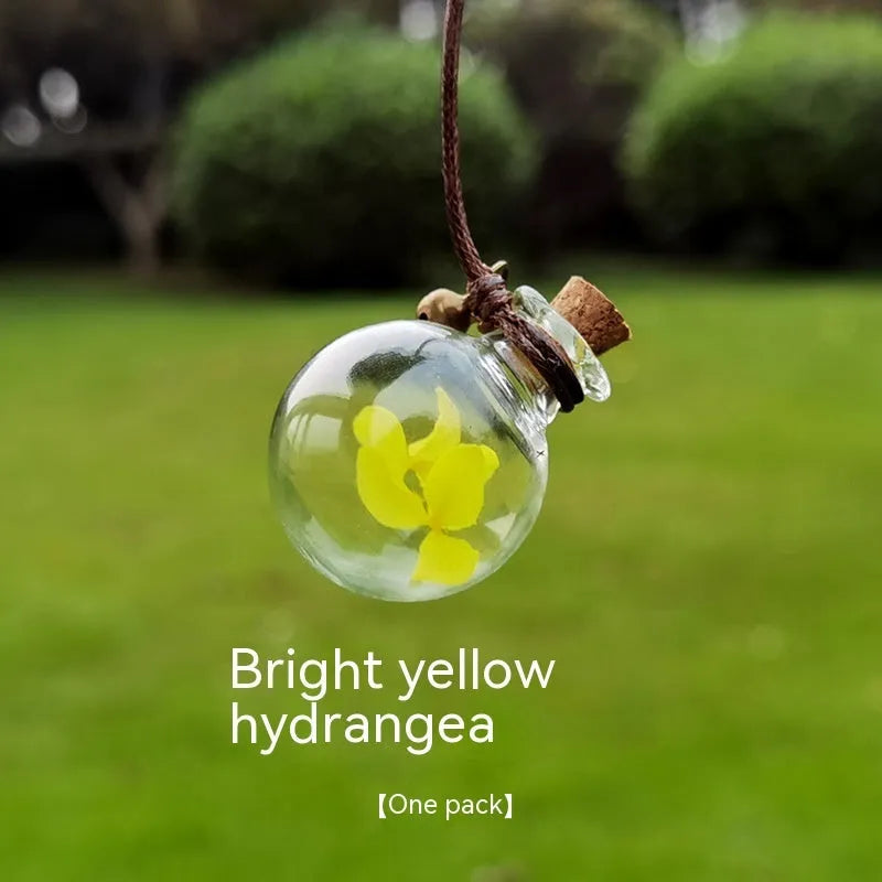Glass car perfume pendant with preserved flowers for interior decoration and air freshening