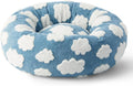 Round plaid dog bed with raised sides on a plastic base, shown in a sea blue and white colour.