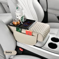 Leather car armrest box cover with wireless charging pad, tissue storage, and cup holder in black.