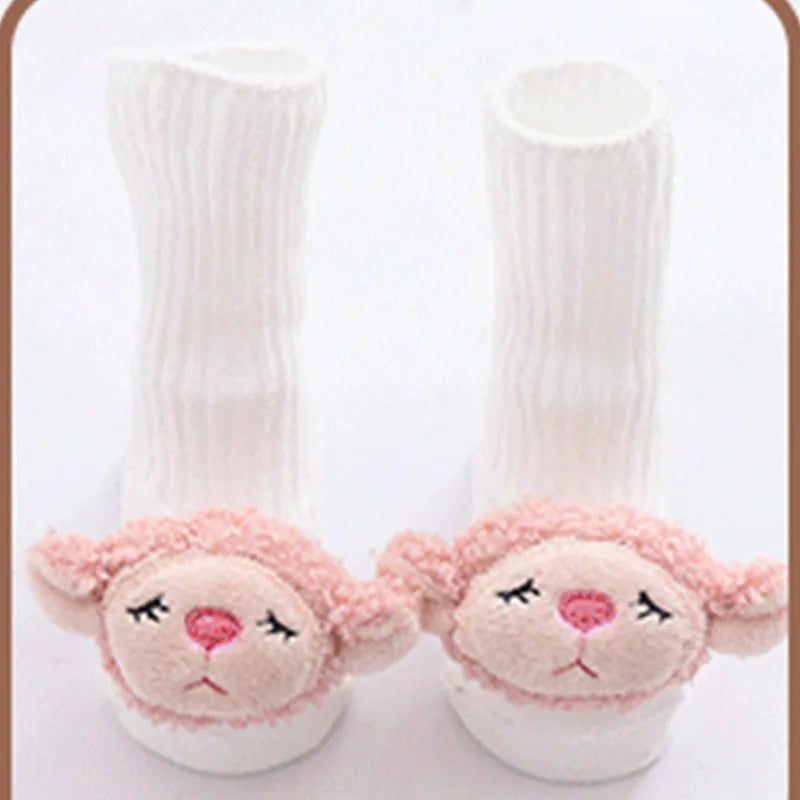 Cotton baby floor socks in various colours and patterns including pink bows, grey stars, and panda design.