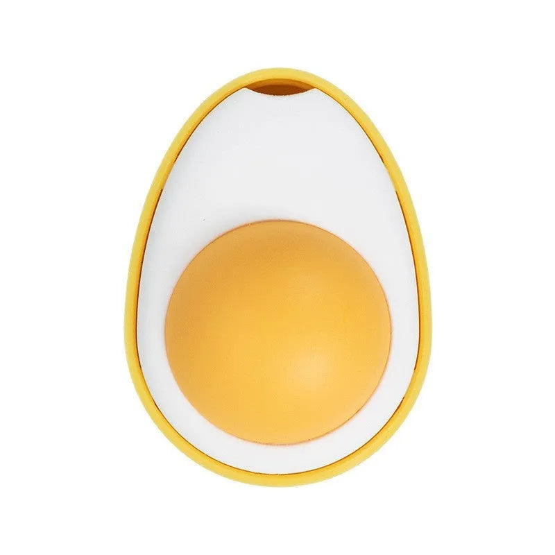 Interactive catnip ball toy with egg design mounted on wall for feline play