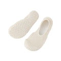 Women's low-top indoor fitness shoes with a soft rubber sole and mesh lining in a solid colour.