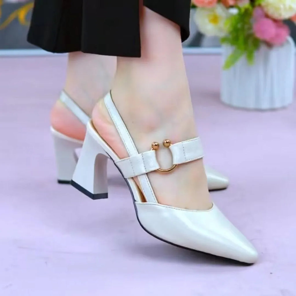 Women's apricot pigskin sandals with a closed toe, chunky heel, and backless oversleeve design.