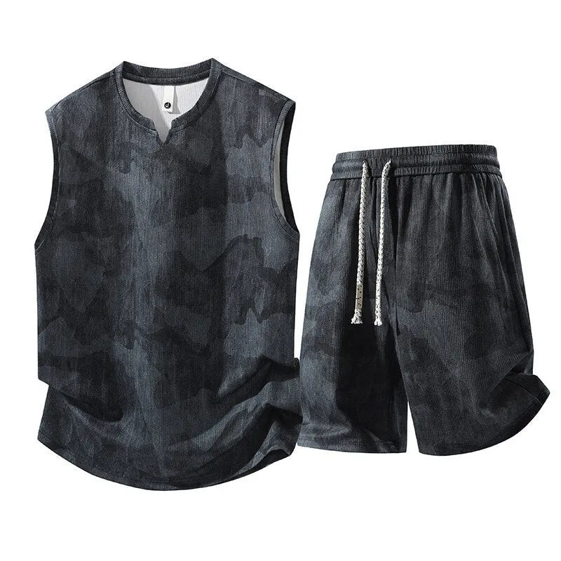 A plus-size casual sleeveless vest and shorts suit set in quick-dry fabric on a hanger.