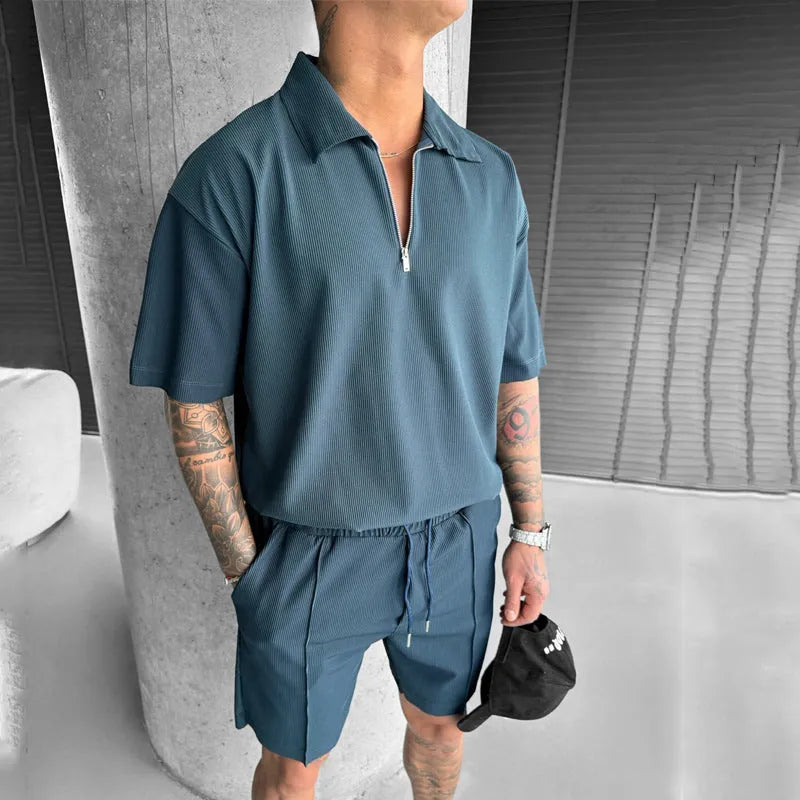 Men's casual suit set with a zipper polo top and drawstring shorts in cotton blend, available in multiple colours and Asian sizing