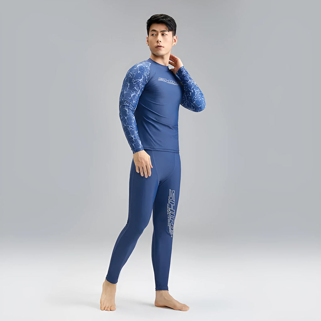 Men's dark blue patterned nylon swimwear set with matching top and trousers