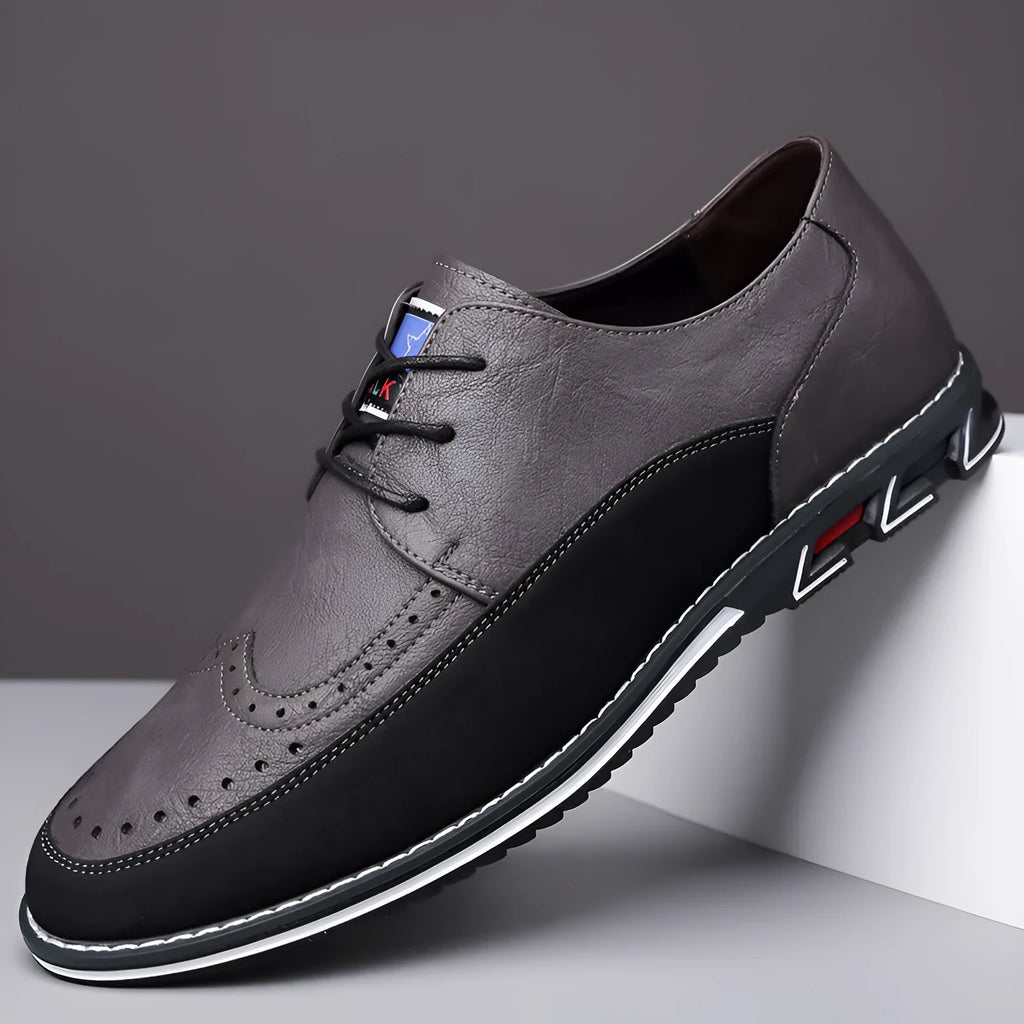 Men's low-top casual leather shoes with a leather toe cap and sewing line detail on fabric upper.