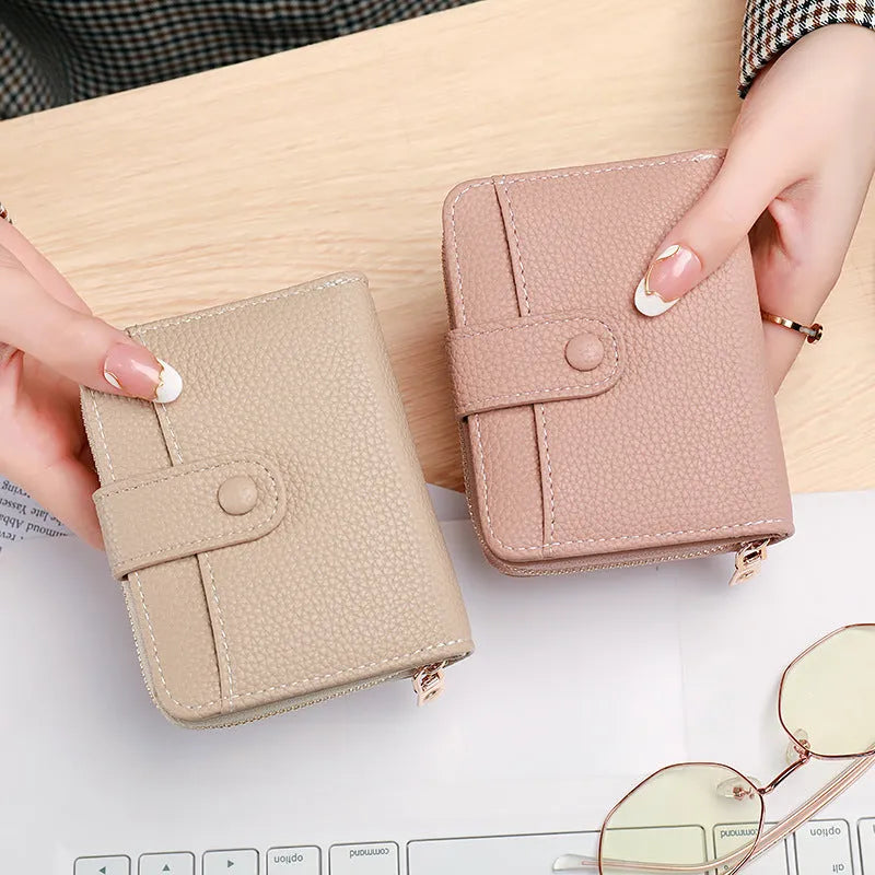 Ladies' short wallet with lychee pattern in pu leather, showing 2-fold compact design
