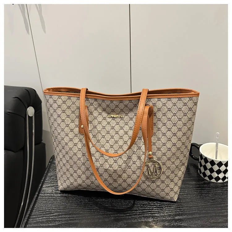 Black PU leather shoulder bag with sewing thread details, shown with grey, brown, and white colour options.