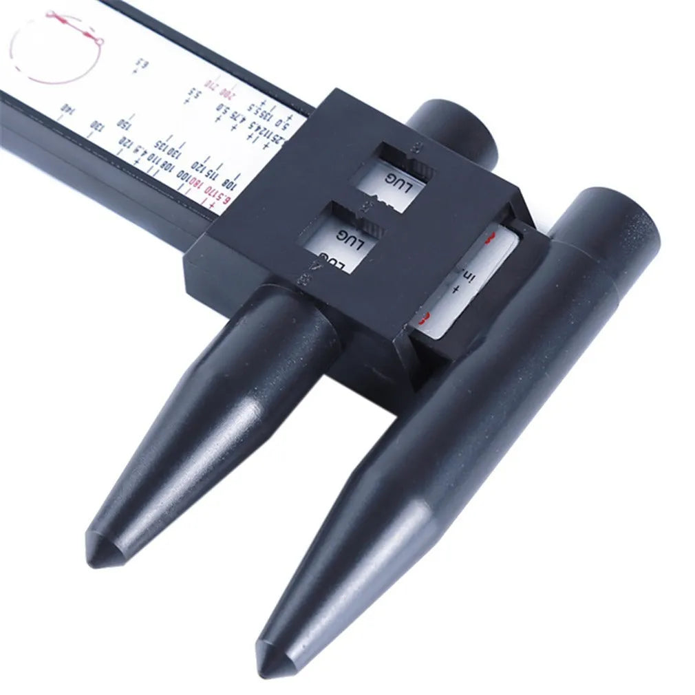 Electronic digital caliper measuring tool with digital display on a plastic body.
