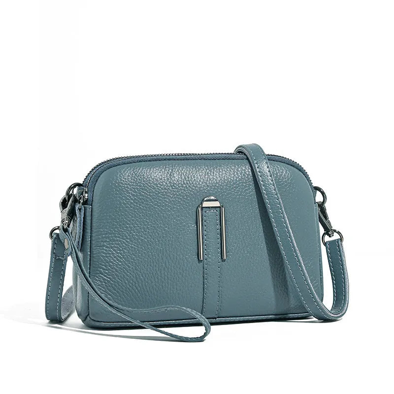 Minimalist top-grain leather crossbody bag in khaki with splicing detail and inner pockets