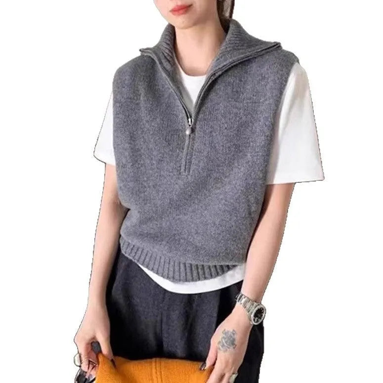 Retro half zip sleeveless knit vest in orange with 3D pattern detail