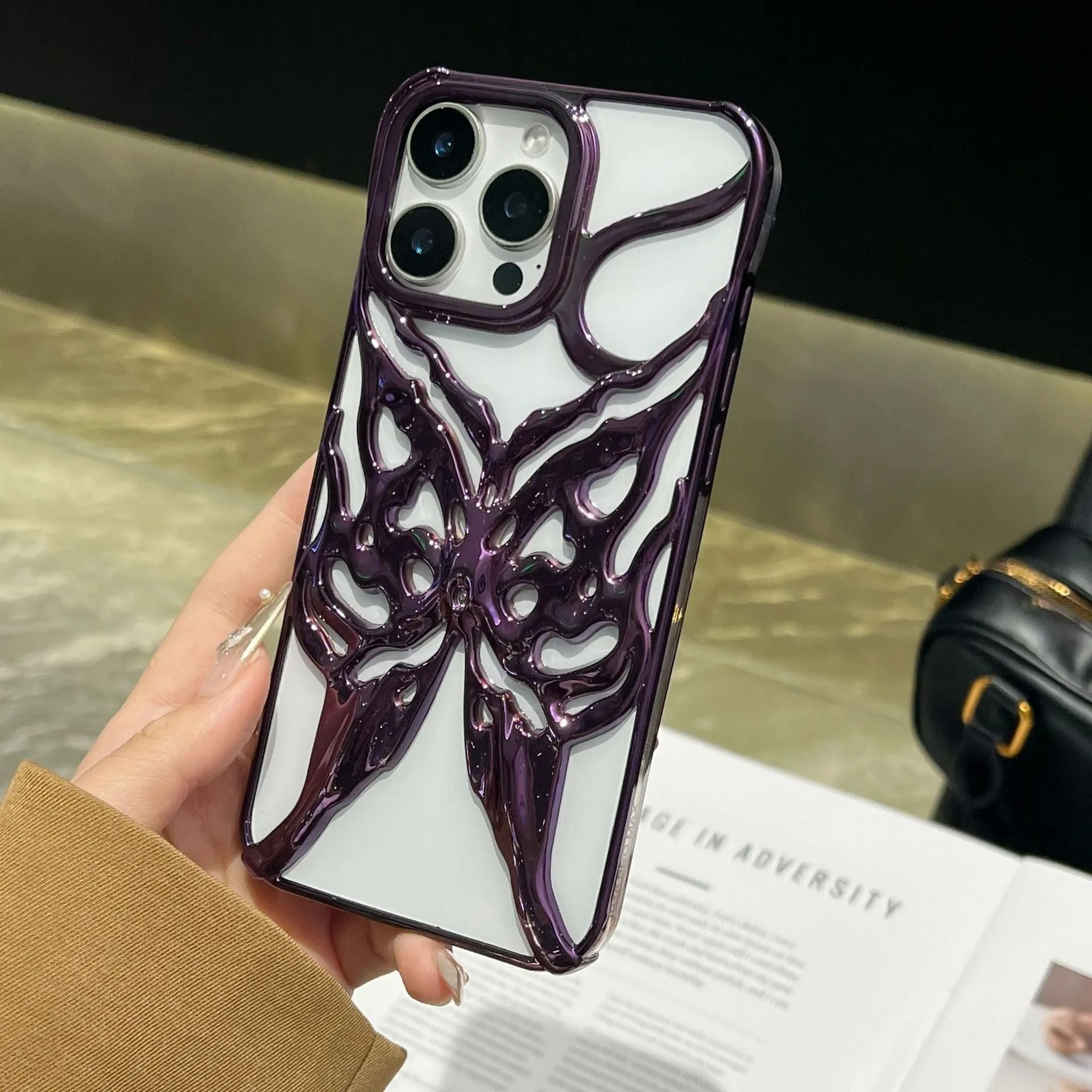 TPU mobile phone case with hollow butterfly electroplated design in silver, suitable for Apple iPhone 16 Pro