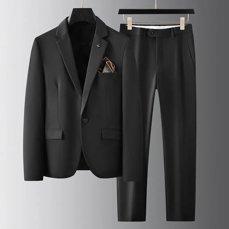 Men's slim fit casual suit set in black, three-piece, with slim tie, full body view