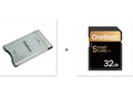 SD to PCMCIA adapter card with stainless steel housing and inserted 32GB SD card for Mercedes-Benz vehicles.
