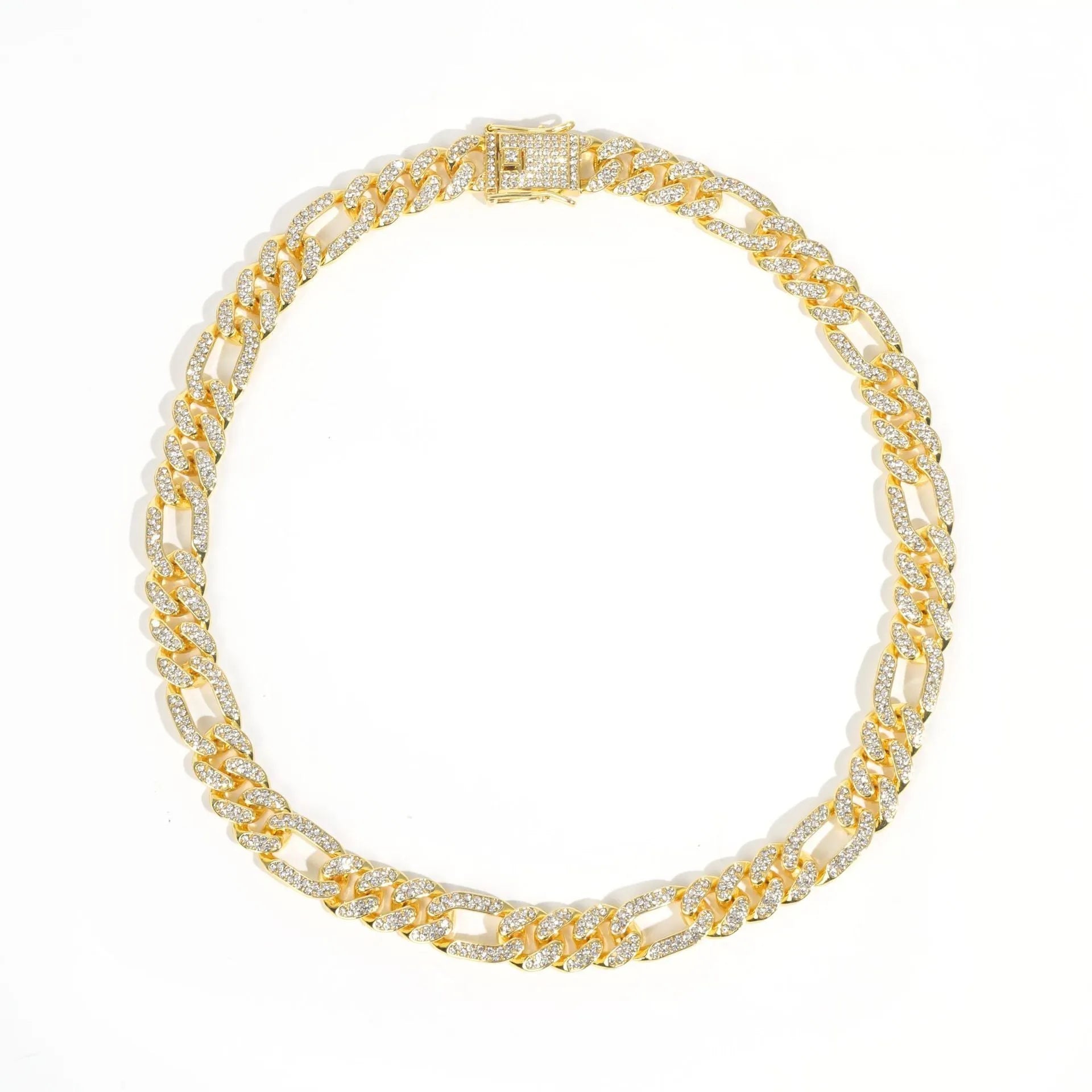 Rap style figaro chain necklace with geometric rhinestone pendant in silver colour on a plain background