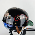 ABS motorcycle helmet in Black Feather design with blue lens visor, side view