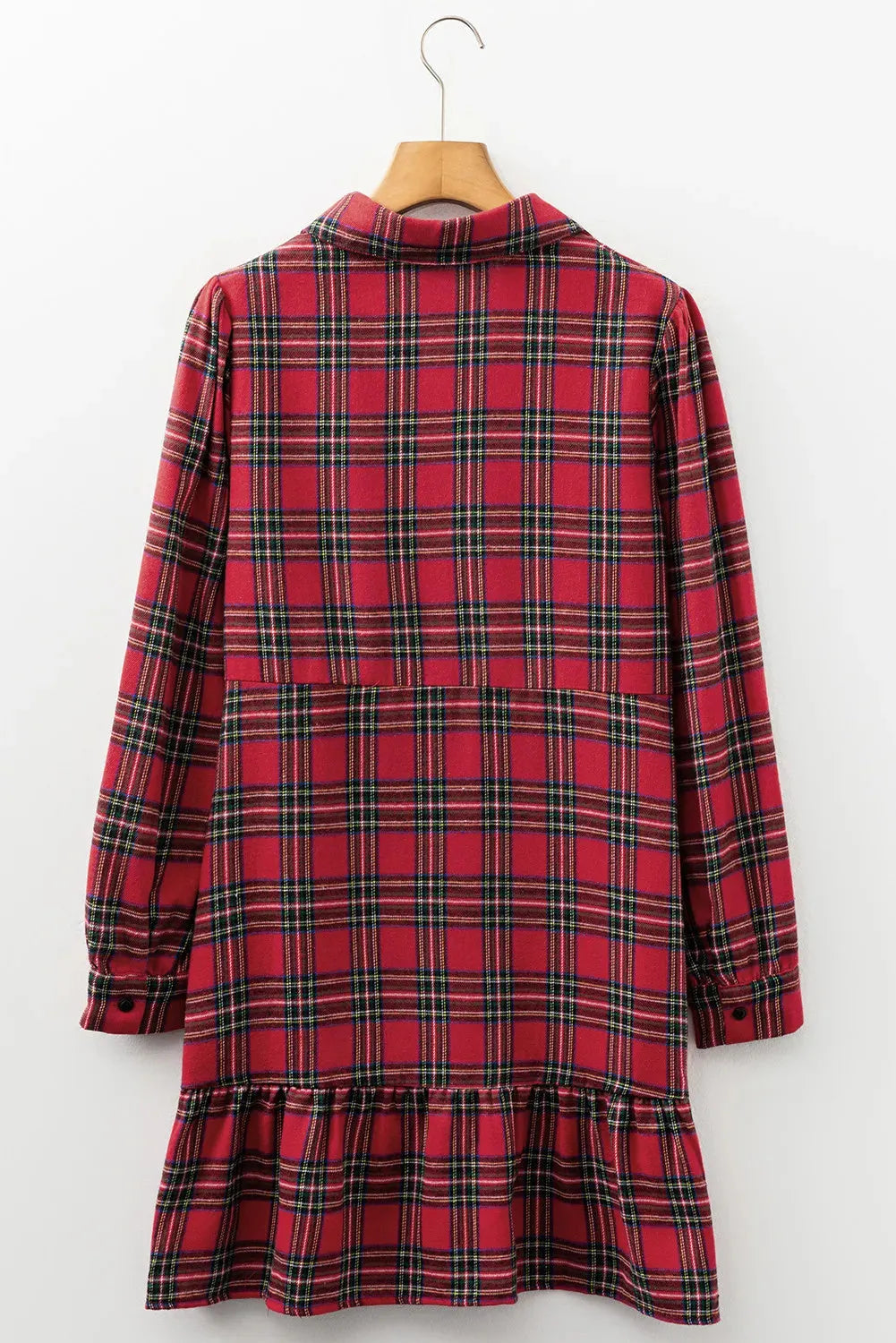 Red plaid mini dress with shirt collar, half-button front, long sleeves, and ruffle hem detailing