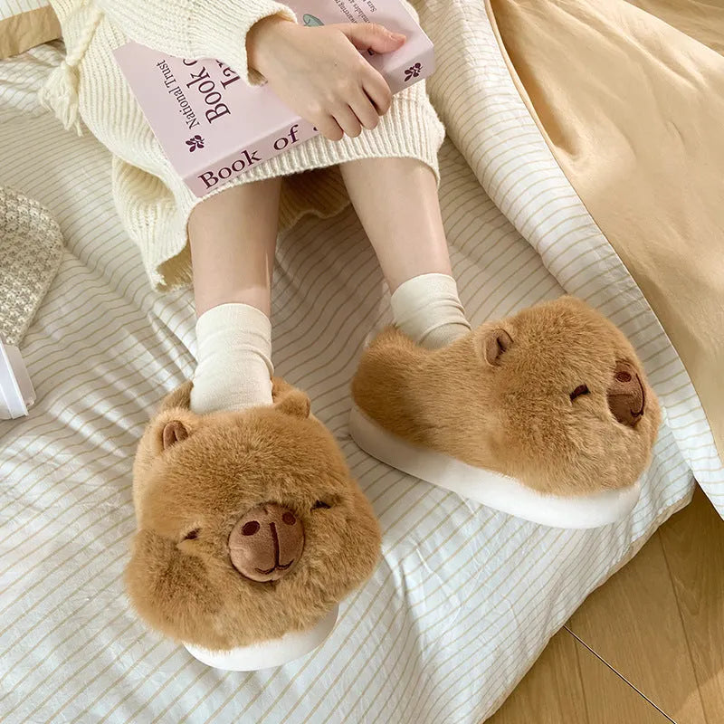 Women's light brown winter slippers with plush upper, artificial wool lining, and cartoon pattern in UK sizes 36-41