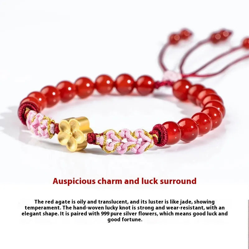 Hand-woven red rope bracelet with diamond shaped crystal and peach blossom Chinese design