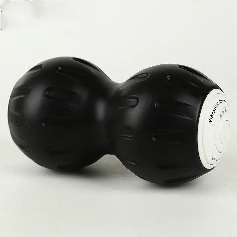 Electric vibrating peanut ball muscle relaxer in blue and black silicone with USB charger for home gym fitness massage