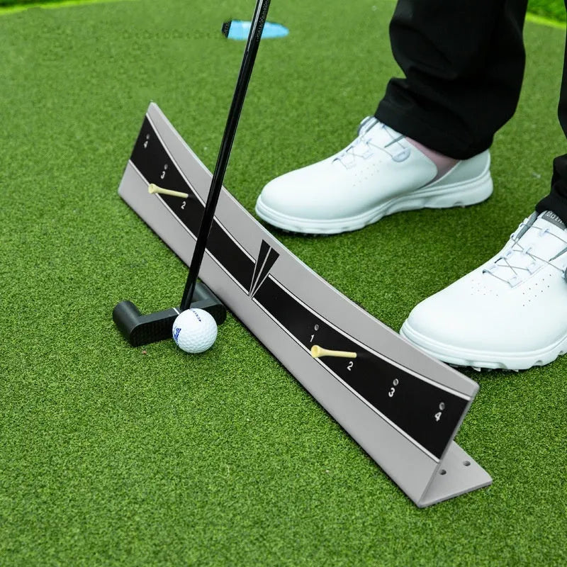 Golf putter trajectory balance simulator with adjustable PVC push rod on a flat surface