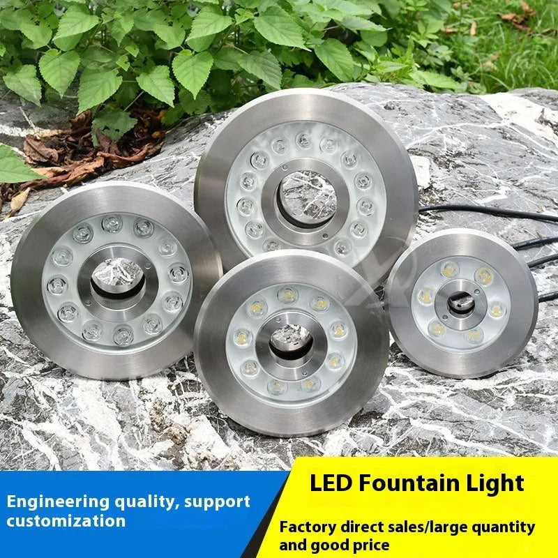 Aluminium alloy outdoor underwater lamp shown illuminated in a garden water feature.