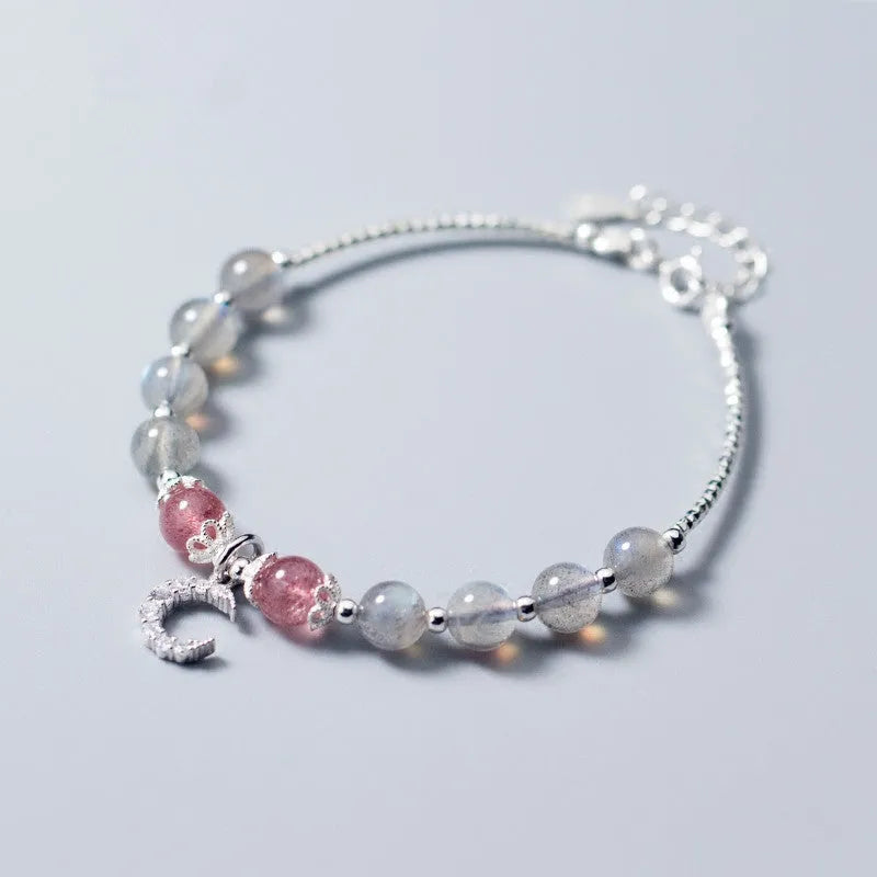 Handmade adjustable moonstone bracelet with 6mm stone and crescent moon charm on silver chain
