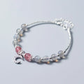 Handmade adjustable moonstone bracelet with 6mm stone and crescent moon charm on silver chain