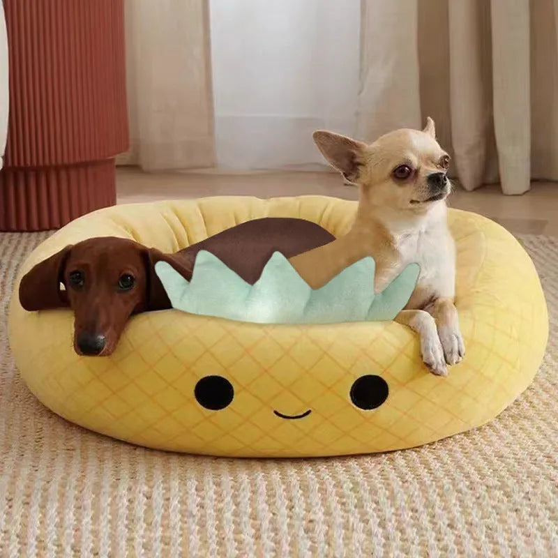 Large Squishmallows plush pet bed in green with bolster edges and non-skid bottom on floor