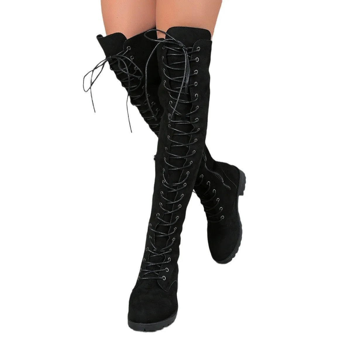 Black lace-up over-the-knee boots with round toe and flat rubber sole on a neutral background