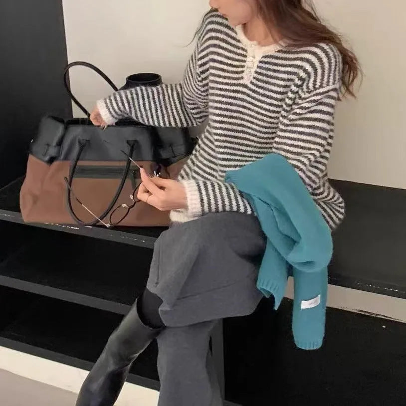 Women's red and blue striped cashmere pullover sweater with loose fit and long sleeves