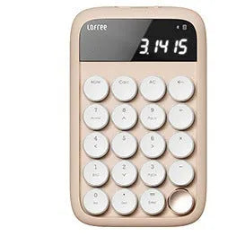 Liquid foundation wireless mechanical keyboard with matching mouse, calculator and desk lamp on office desk
