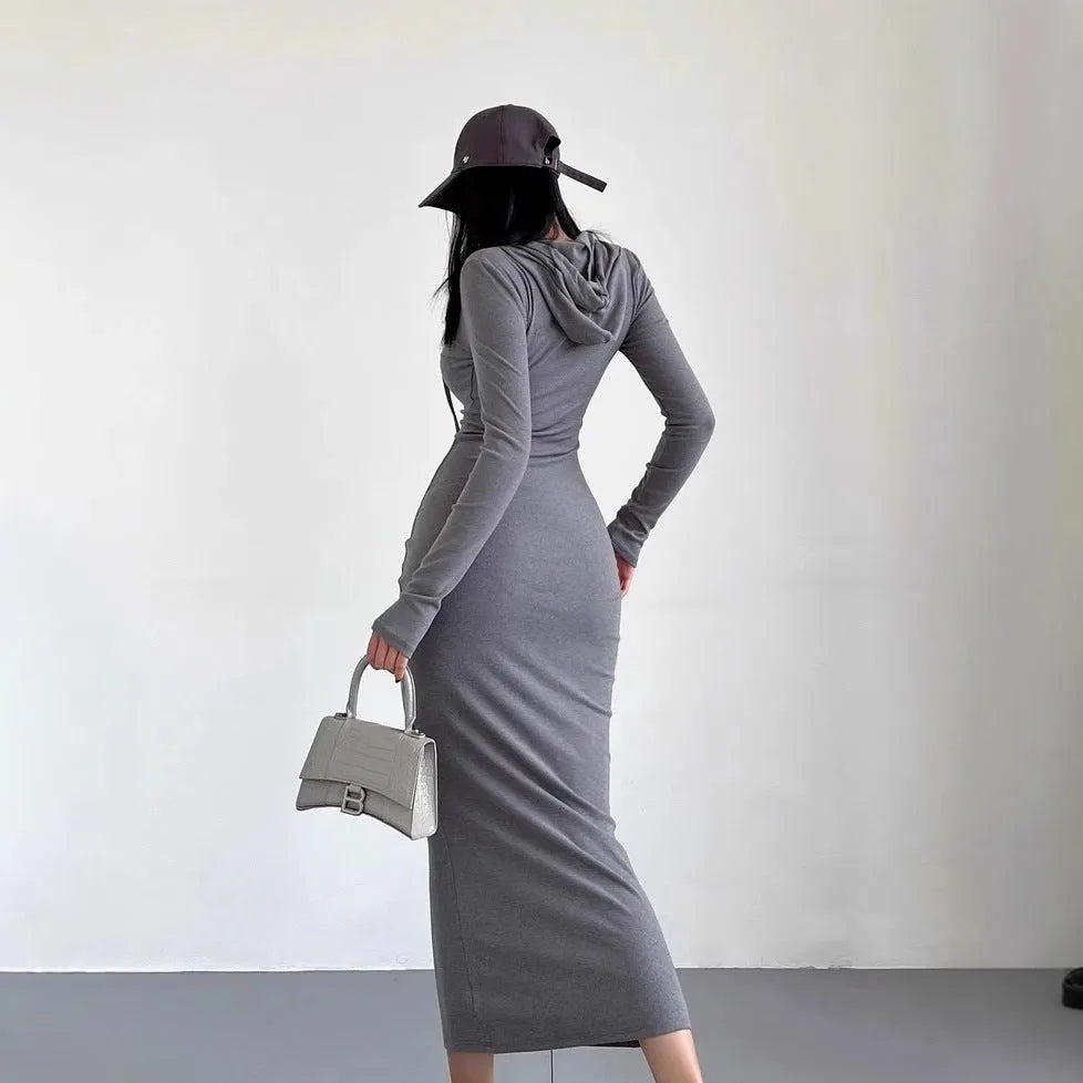 Women's light gray hooded sheath dress with long sleeves and a high waist on a hanger
