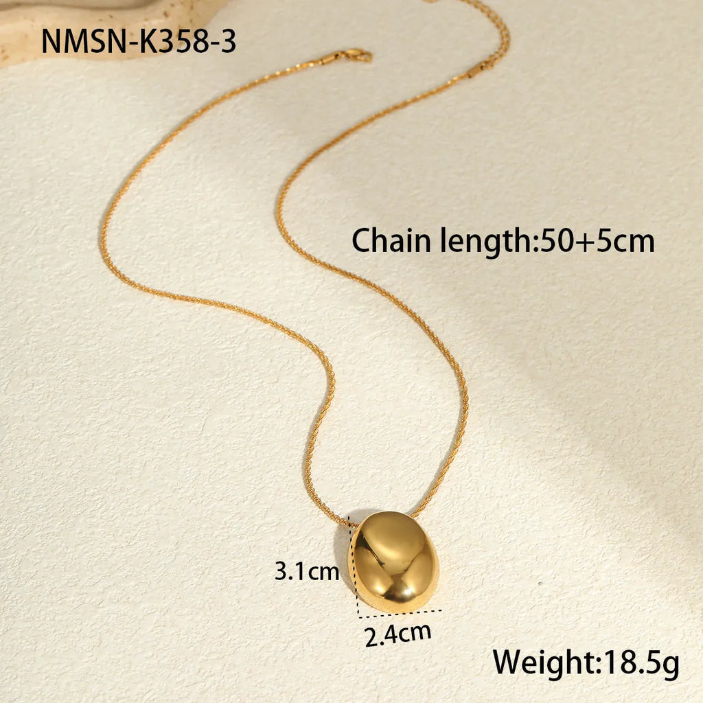 Gold geometric pendant necklace on adjustable 41-50cm chain with stainless steel construction
