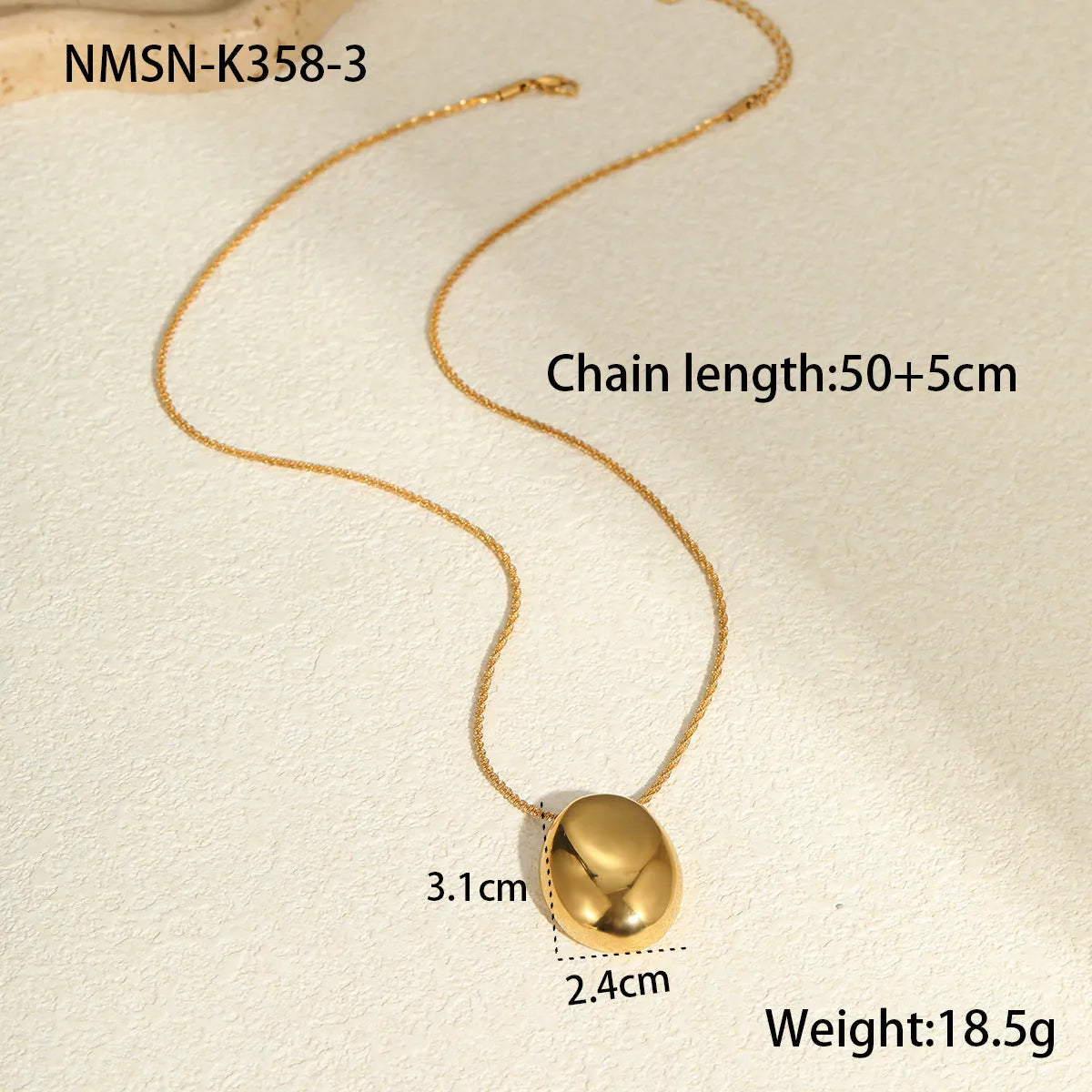 Gold geometric pendant necklace on adjustable 41-50cm chain with stainless steel construction
