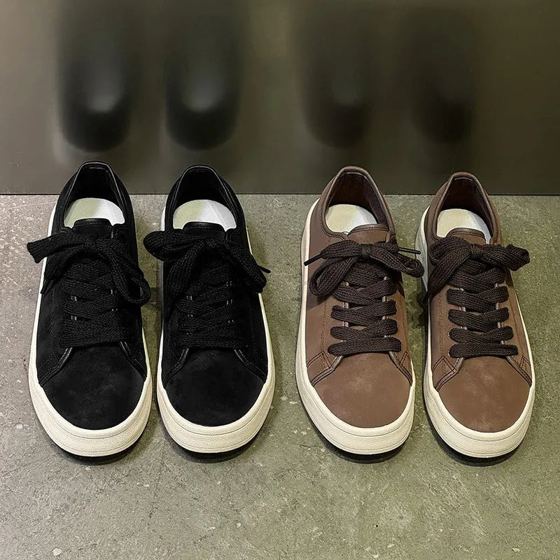 Breathable matte leather sports casual shoes in black with stitched detailing, low-top profile, and rubber sole