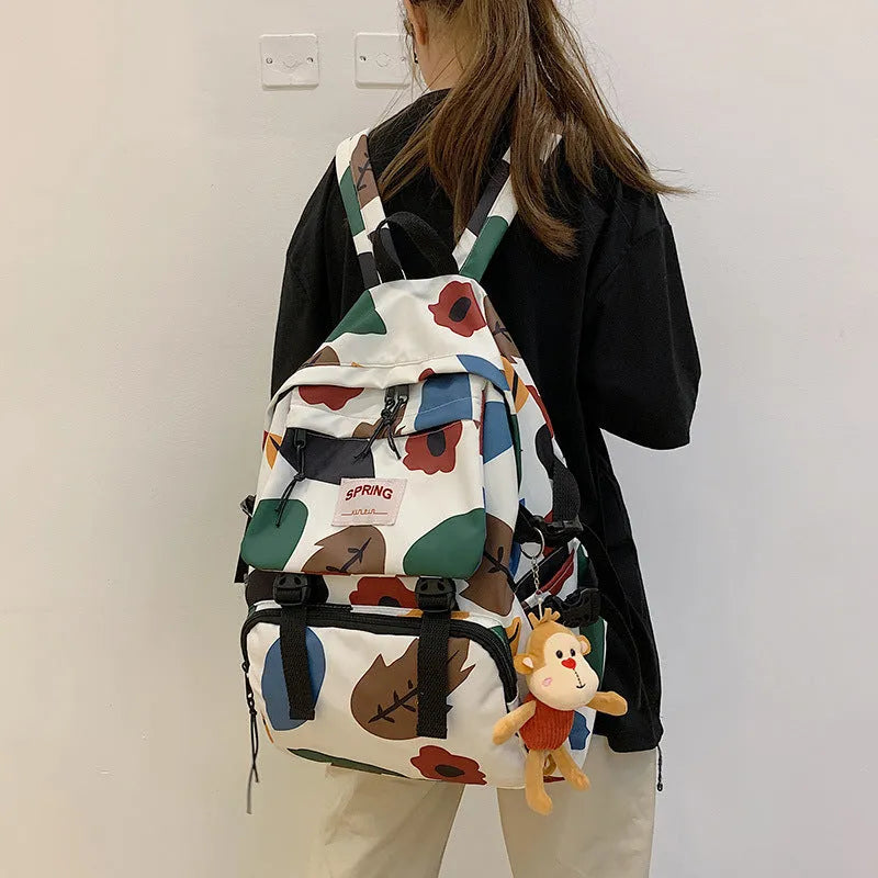 Mori style contrast colour nylon travel backpack for students, geometric pattern, black colour, 20-35L capacity